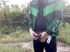Young Boy Playing in the Woods