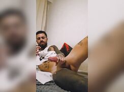 Tattooed Bearded Guy Jerks Off and Cums on the Bed