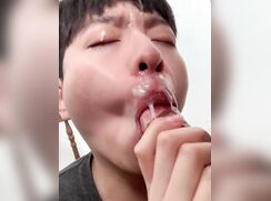 Cocksucker sucks two dicks and gets a facial