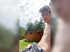 Sunbathing and jerking in the garden