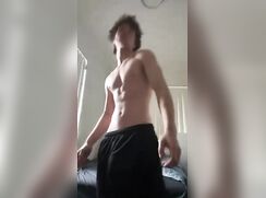 Hung muscle boy in black shorts