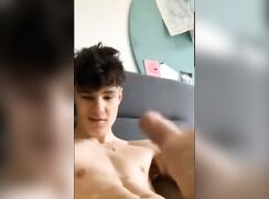 Twink wakes up horny and jerks his big uncut cock