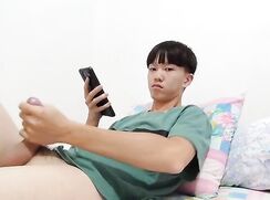 A quiet boy ejaculates in his room.
