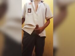 Indonesian student playing with his cock in the school restroom