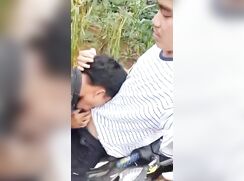 Sucking my guy's cock in the orchard.