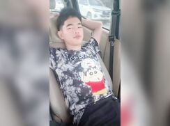 He should definitely be wearing a seatbelt, even in the back seat.