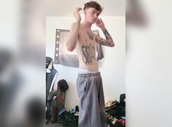 cute tattooed big cock strip reveals