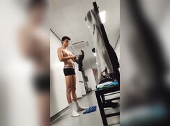 Naked in the locker room.