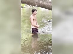 Jerking off in the river