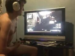 Gamer wanking and cumming during the game whilst talking to friends