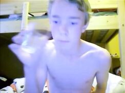 blond guy cums into a glass and drinks it