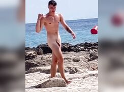 Naked Italian boy on the beach