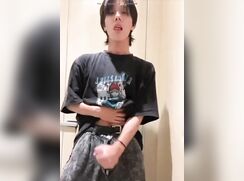 asian college student wanks in bathroom