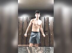 Fit teen dancing in the lockerroom