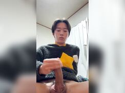 Japanese twink tosses out a load