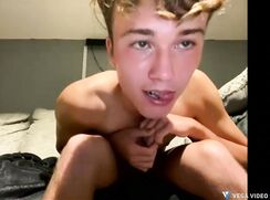 Cute blonde twink fingers his hole, jerks off, shows his tight ass