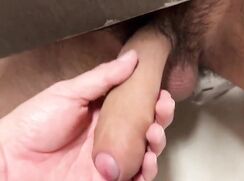 Hot public toilet under stall jerking and fucking.