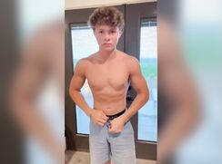 cute smooth twink shows off his nice ass