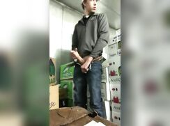 Horny teen jacks off in the store room