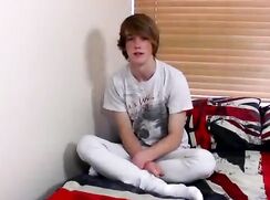 Adorable young gay Kai Alexander stroking big cock solo