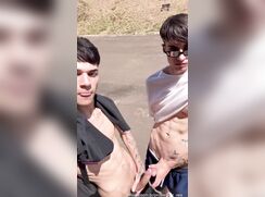Two cute young twinks fucking in public