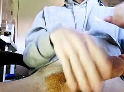 Ginger watching porn and stroking his big hair cock