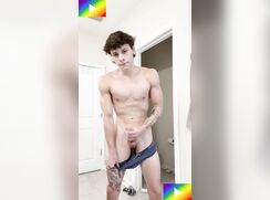 # HTW - Tattooed young guy goes for a solo stroke in the bathroom