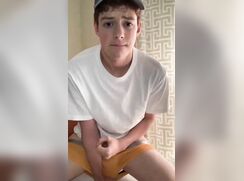 Wearing a baseball cap