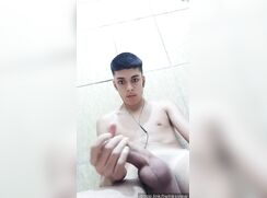 Latino pup stroking his bone