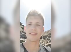 Blond twink wanks & cums outdoors