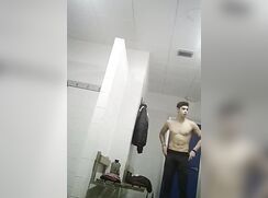 cute fit brunette changing undeweare at loocker room