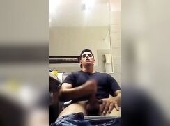 Hung jock wanks cums and eats it