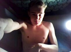 Hung boy jerks himself in bed