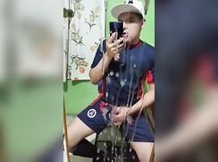 Latino Soccer Fan Coats His Mirror