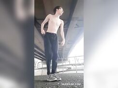 Twink Strips and Cums Under a Bridge