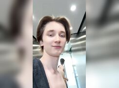Naked exhib. twink in an elevator