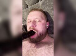Jamie Elliot sucking another dildo