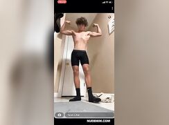 Bushy-Haired Guy Flexes His Muscles