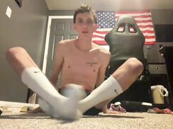 Showing his hole with socks on