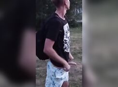 Shaved Cock Exhibitionist Jerks Outdoors While Cars Pass For Dare