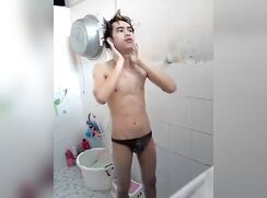 Asian Twink Washes & Then Plays With Skinny Cock